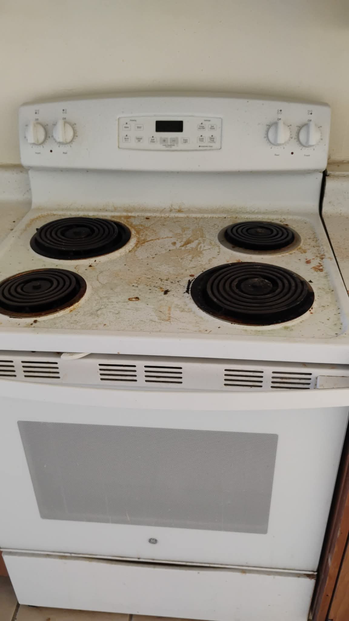 Kitchen stove before deep cleaning by A&A Cleaning Services Texas in San Antonio